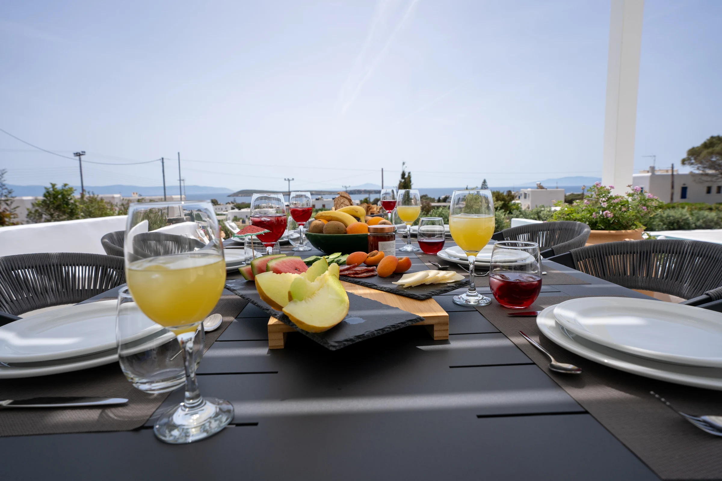 Breakfast laid out on the terrace overlooking the pool
